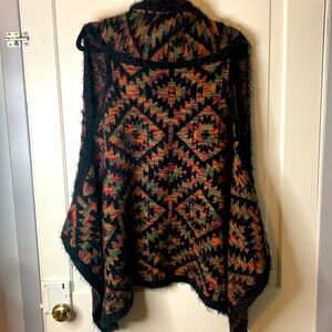 One sz fits all sweater vest Aztec Santa Fe look.